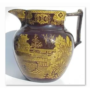 Gilt-decorated antique pitcher